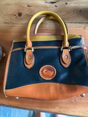 Dooney & Bourke Black, Tan & Yellow Pebbled Leather Satchel